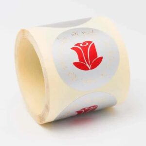 ETSJ8-Rollo ETIQUETAS ROSA FONDO PLATA IMPRESIÓN PELÍCULA ORO Y ROJO Ø50mm. 250ud.